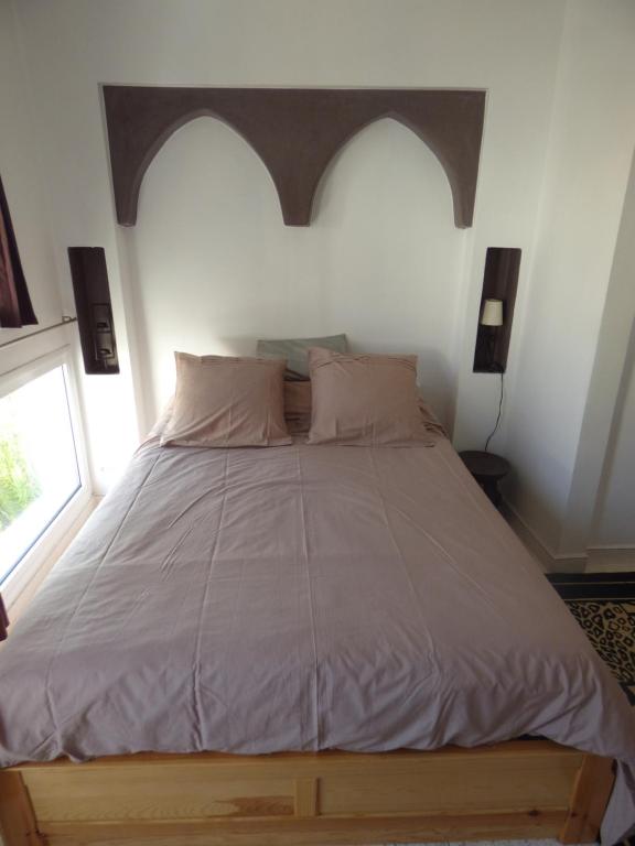 Una cama o camas en una habitación de Janna d'Ifni
