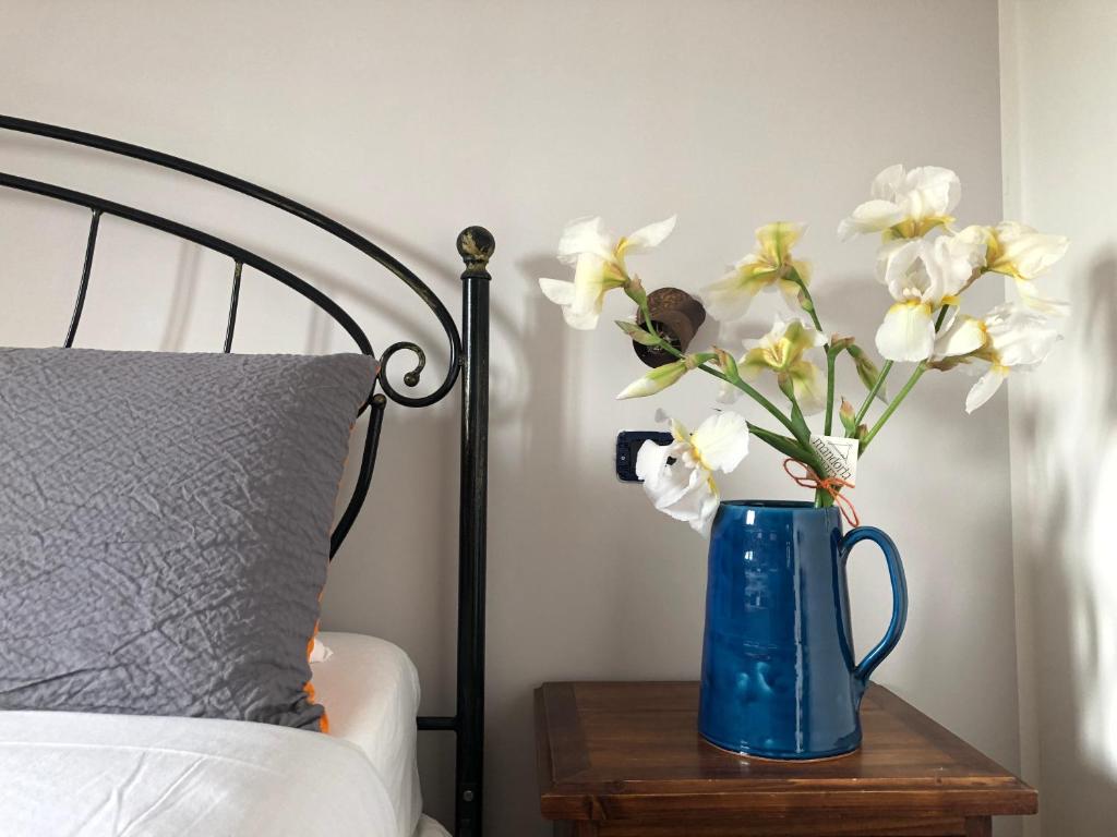 Llit o llits en una habitació de B&B Mandorla Amara