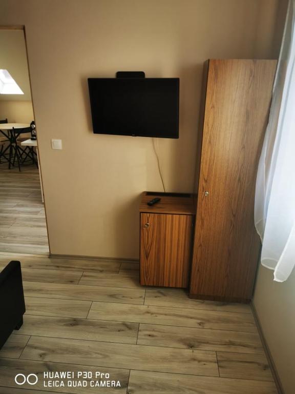 TV a/nebo společenská místnost v ubytování Renáta Apartman