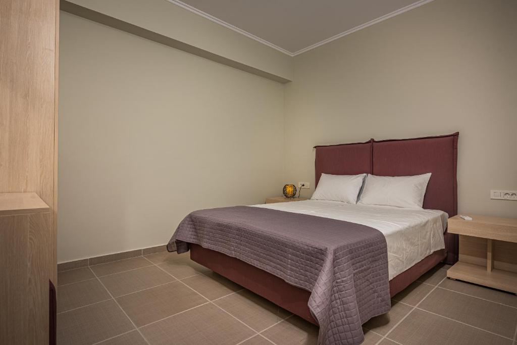Postel nebo postele na pokoji v ubytování Metsovo Big Apts