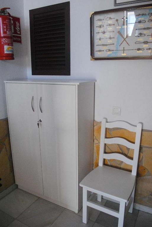 Telewizja i/lub zestaw kina domowego w obiekcie Hostal Costa De La Luz