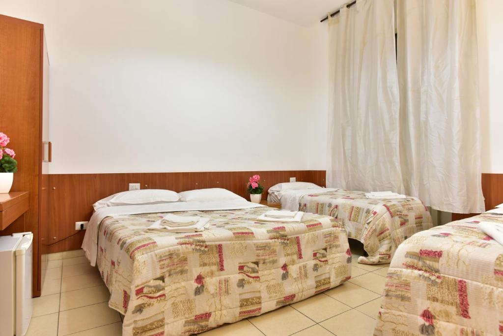 Posteľ alebo postele v izbe v ubytovaní B&B Termini