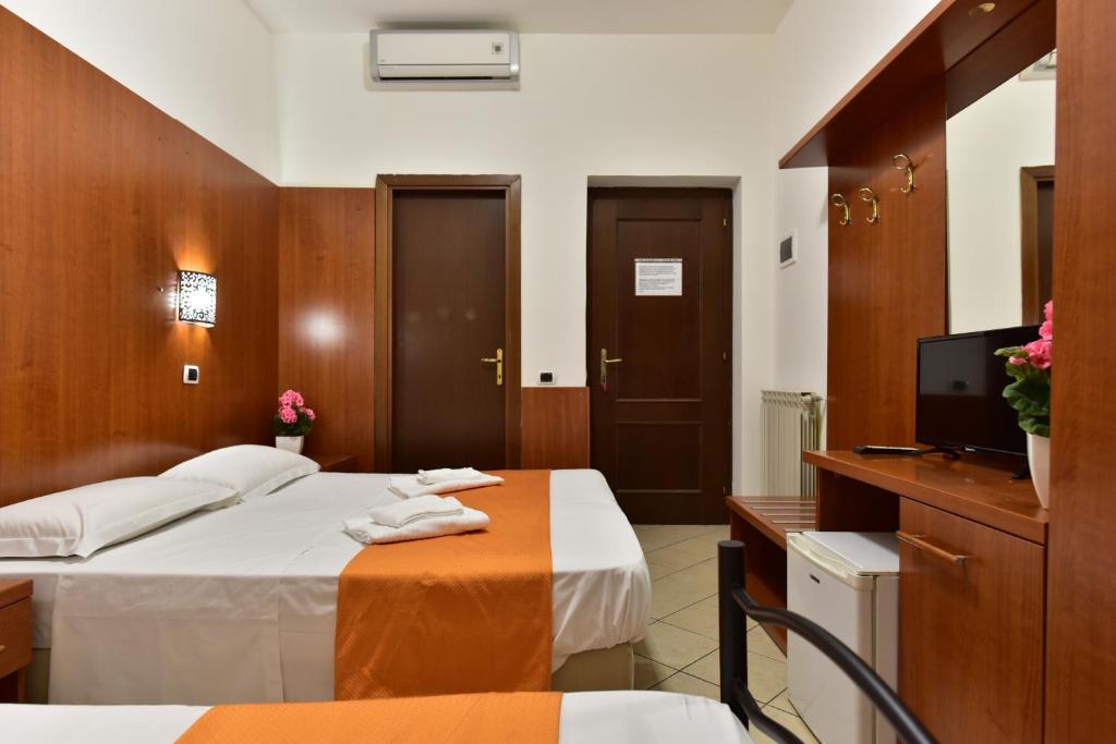Posteľ alebo postele v izbe v ubytovaní B&B Termini
