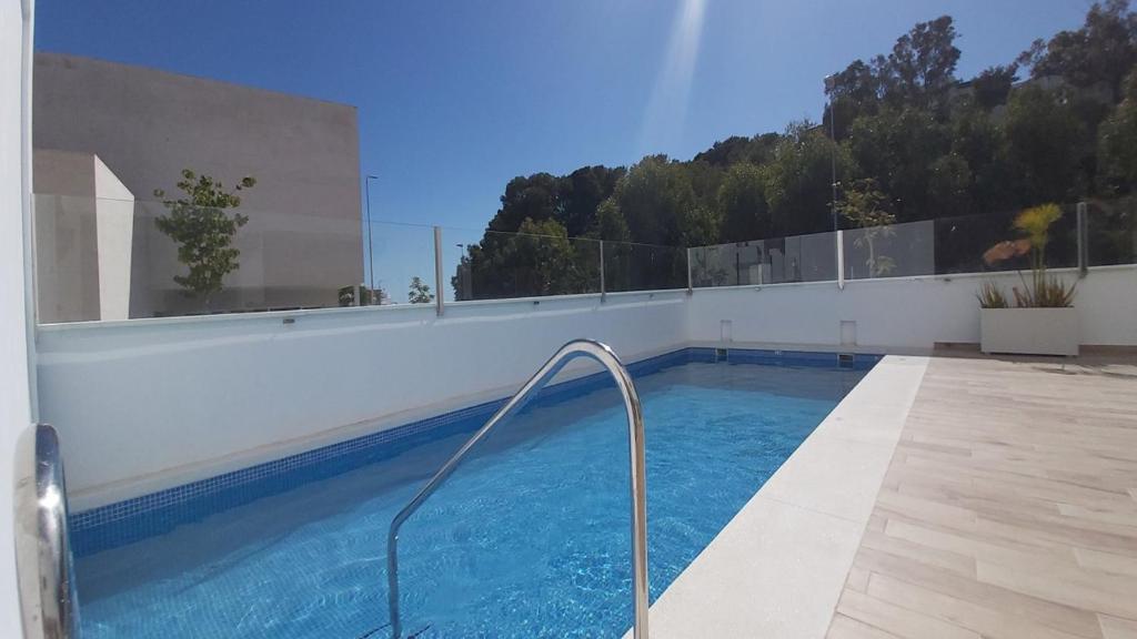 Bazén v ubytovaní Conil Luz de Mar alebo v jeho blízkosti