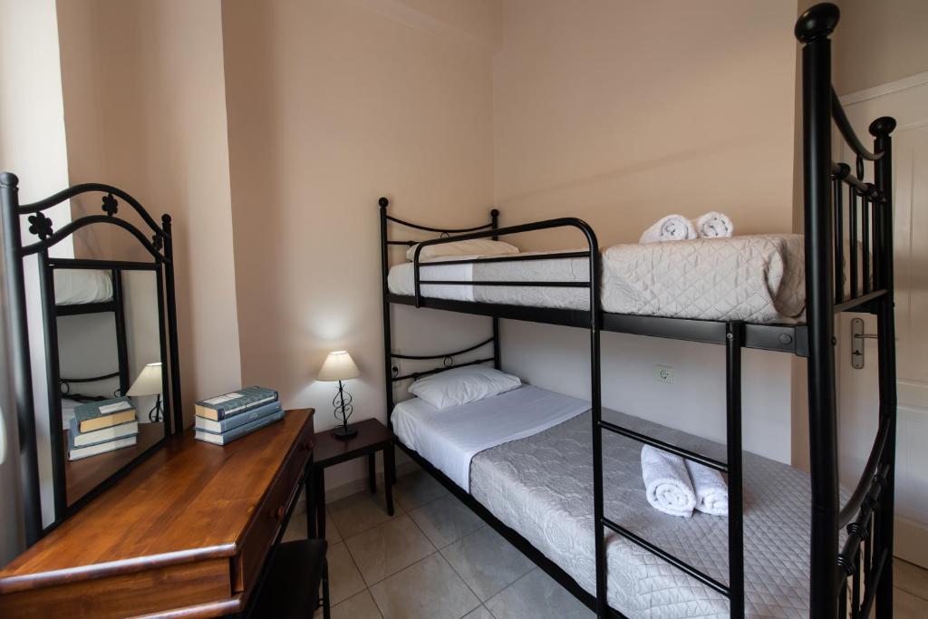 Postel nebo postele na pokoji v ubytování Villa Nektaria