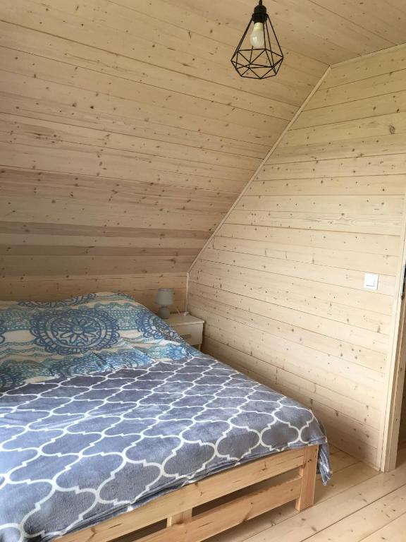 Postel nebo postele na pokoji v ubytování White Houses Rewal