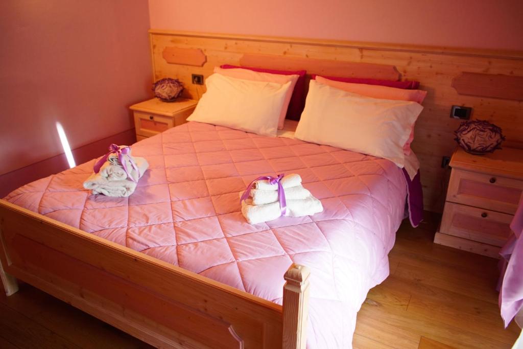 A bed or beds in a room at Agriturismo Grammelot