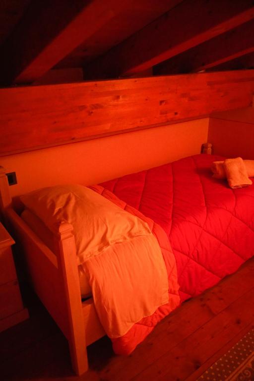 A bed or beds in a room at Agriturismo Grammelot