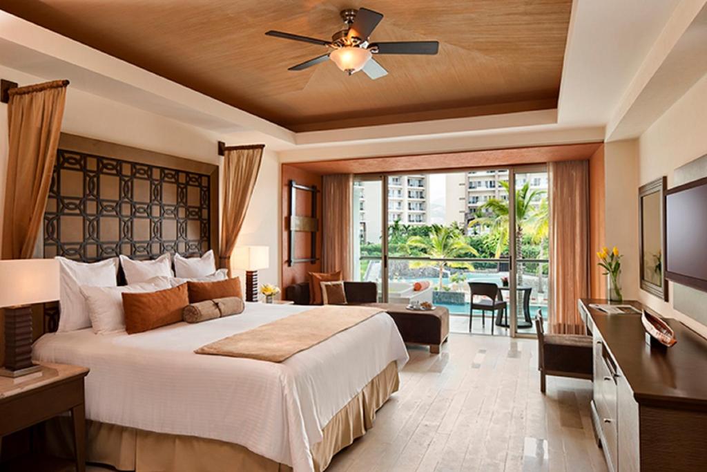 Postel nebo postele na pokoji v ubytování Dreams Vallarta Bay Resorts & Spa - All Inclusive