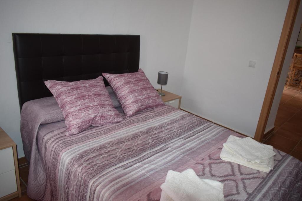 Posteľ alebo postele v izbe v ubytovaní BAMBÚ · Casa rural en Vejer con piscina privada