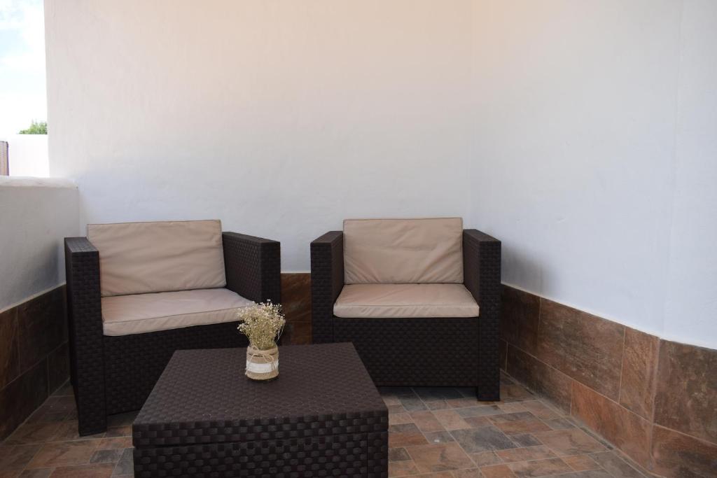 Posedenie v ubytovaní BAMBÚ · Casa rural en Vejer con piscina privada