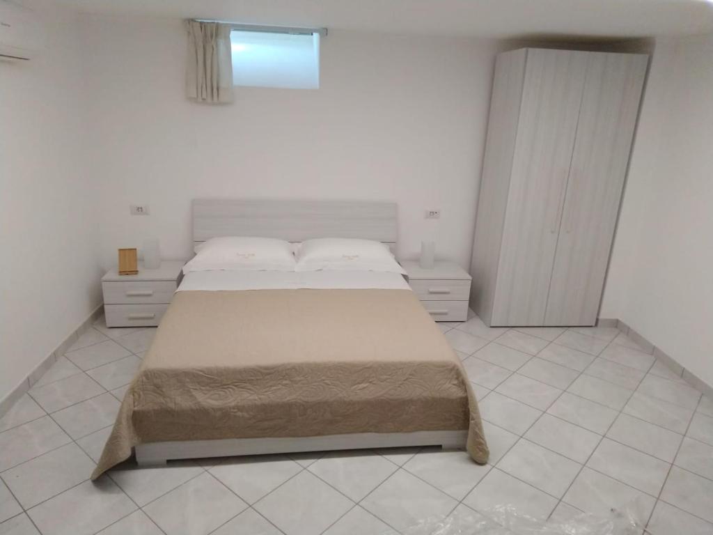 Postel nebo postele na pokoji v ubytování AMAA CASA