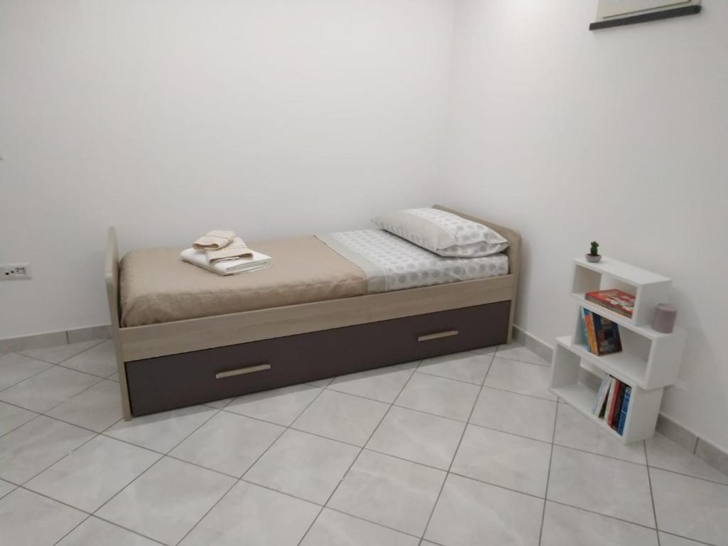 Postel nebo postele na pokoji v ubytování AMAA CASA