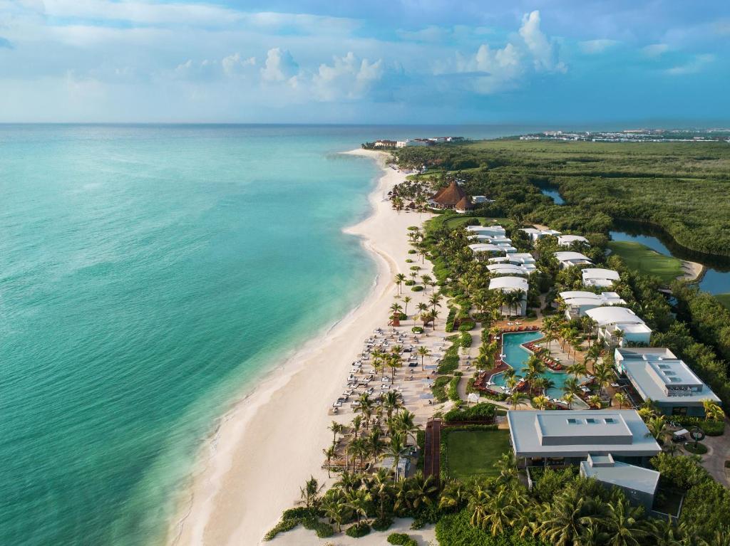 an aerial view of the beach at the excellence punta cana resort at Andaz Mayakoba All Inclusive in Playa del Carmen
