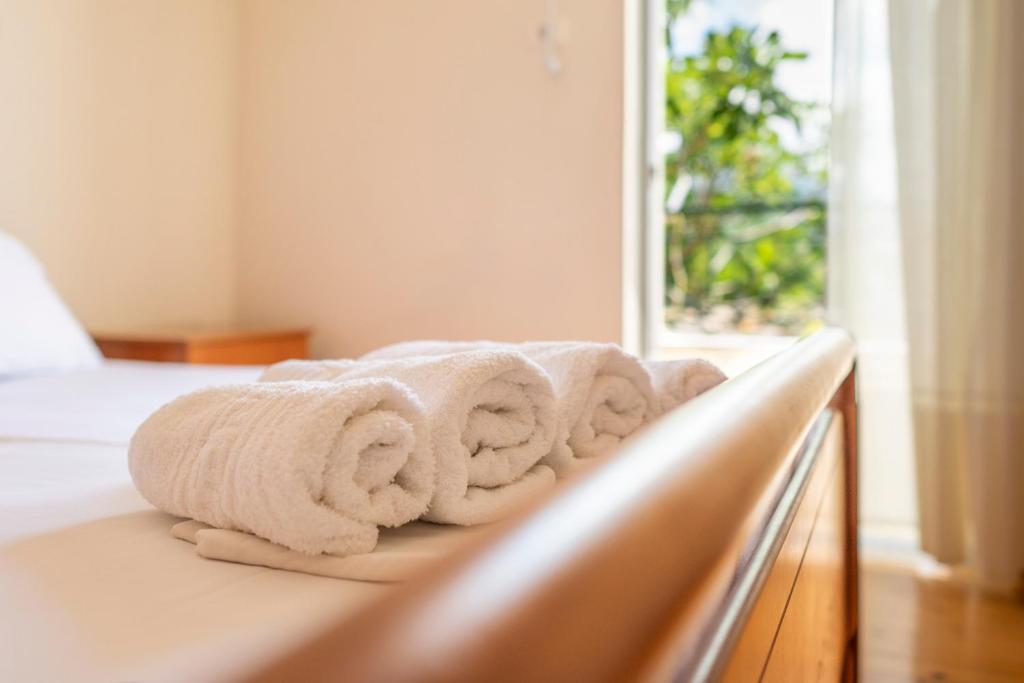 Postel nebo postele na pokoji v ubytování Janakis Apartments