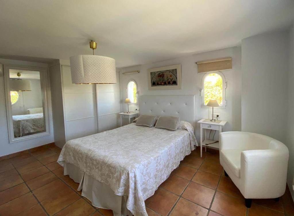 Postel nebo postele na pokoji v ubytování Villa las Tinajas Luxury
