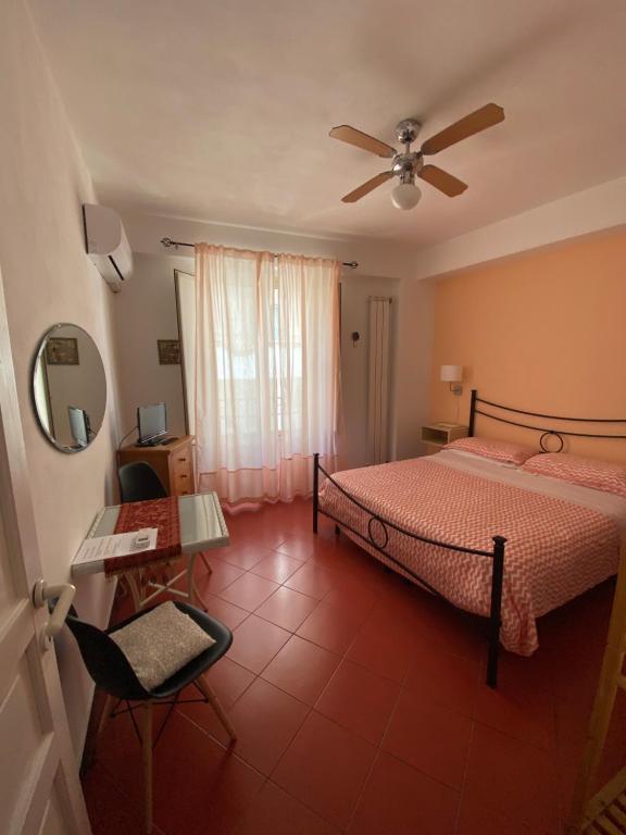 Posteľ alebo postele v izbe v ubytovaní Taormina’s Sun