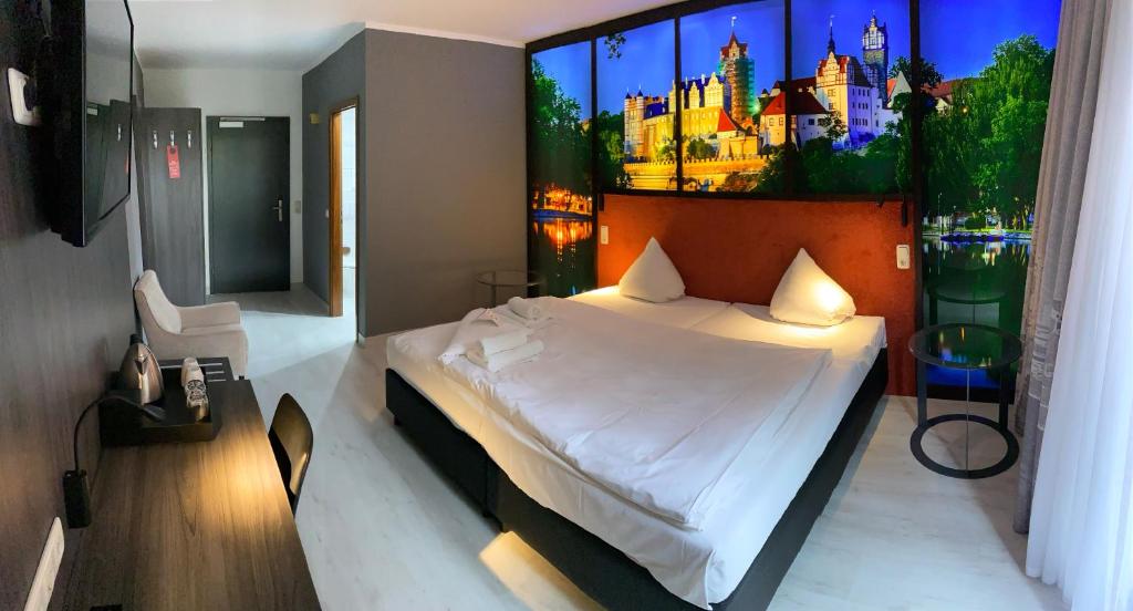 Postel nebo postele na pokoji v ubytování SL'otel im Parforcehaus