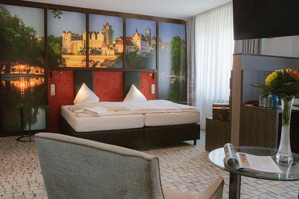Postel nebo postele na pokoji v ubytování SL'otel im Parforcehaus
