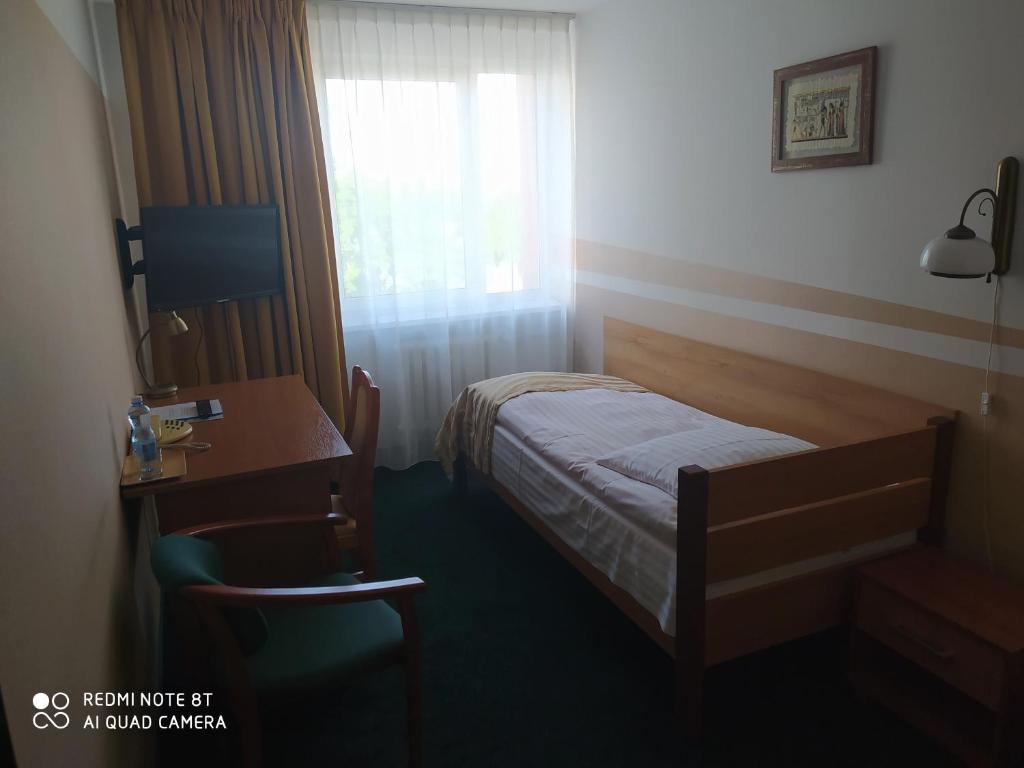 Telewizja i/lub zestaw kina domowego w obiekcie Hotel Konin