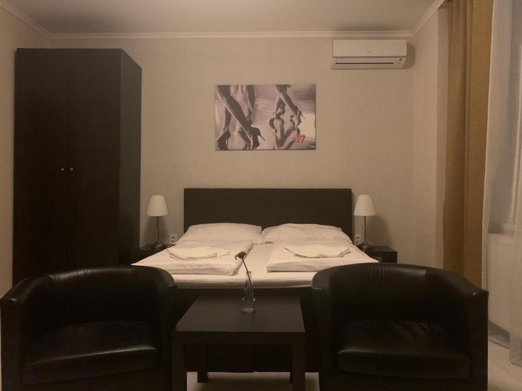 Postel nebo postele na pokoji v ubytování LAS PALMAS ROOMS