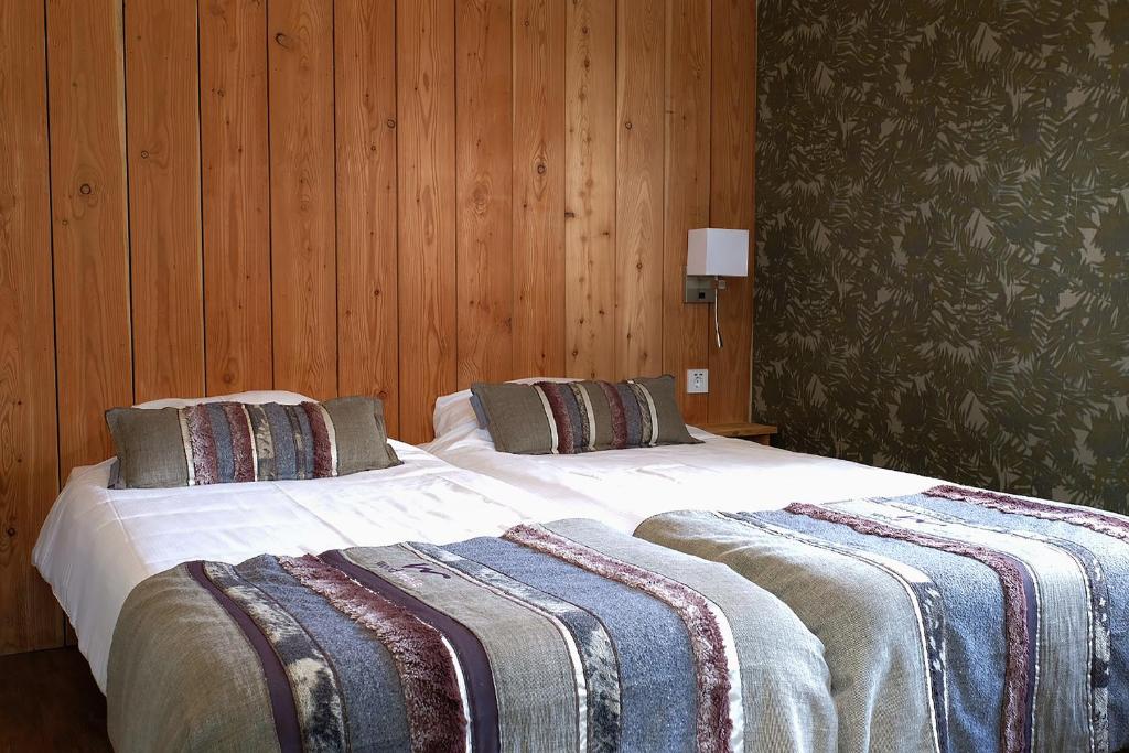 Postel nebo postele na pokoji v ubytování Landgoedhotel Woodbrooke Barchem