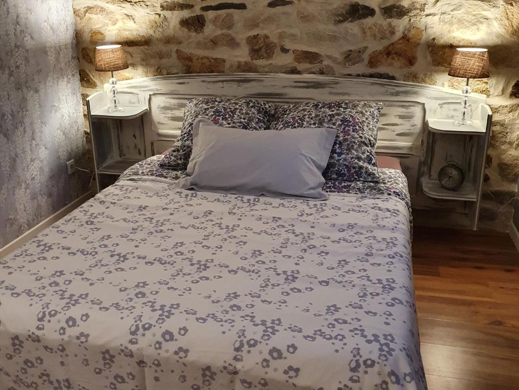 Postel nebo postele na pokoji v ubytování Graine de Reves