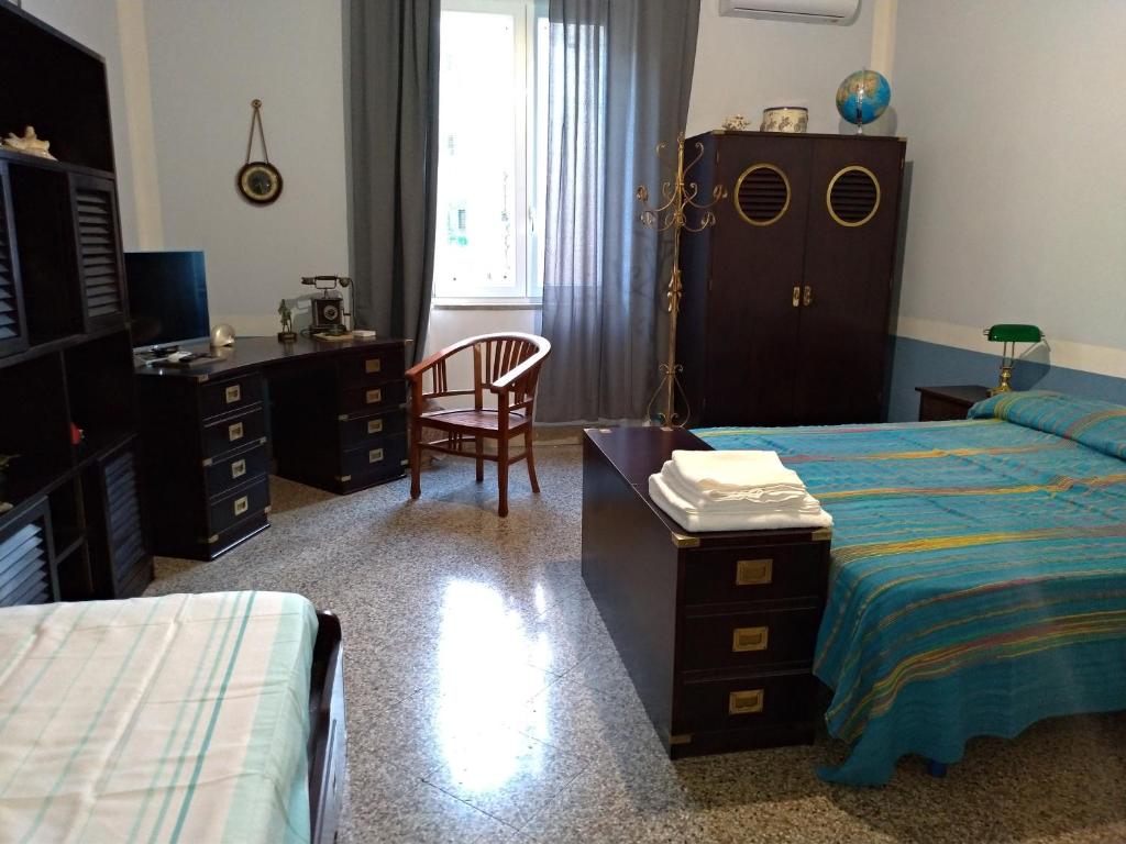 Postel nebo postele na pokoji v ubytování Il Genio del Porto - Mabbonath b&b