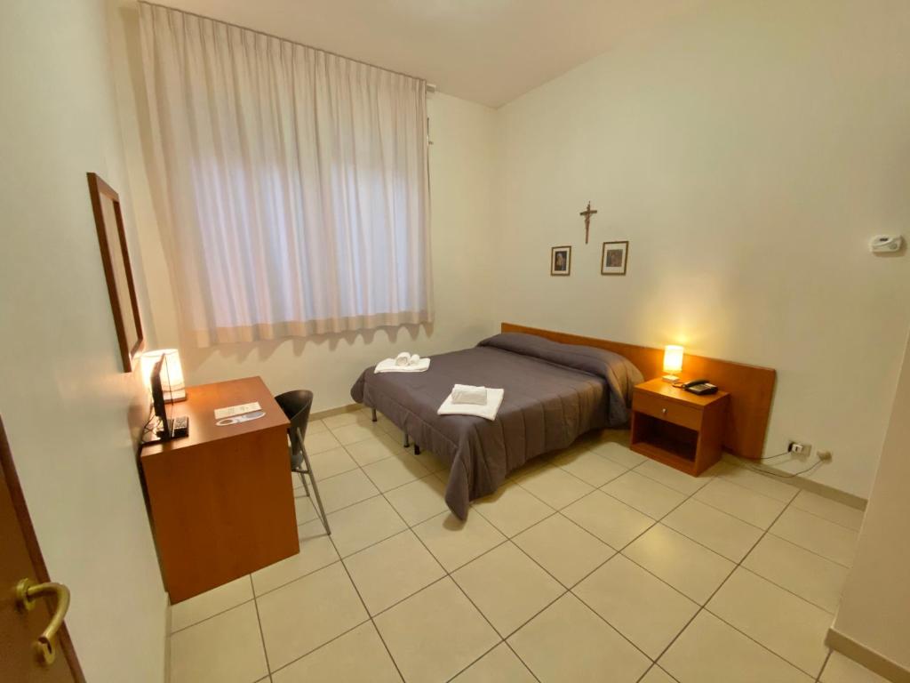 Letto o letti in una camera di Casa per Ferie Sant'Anna