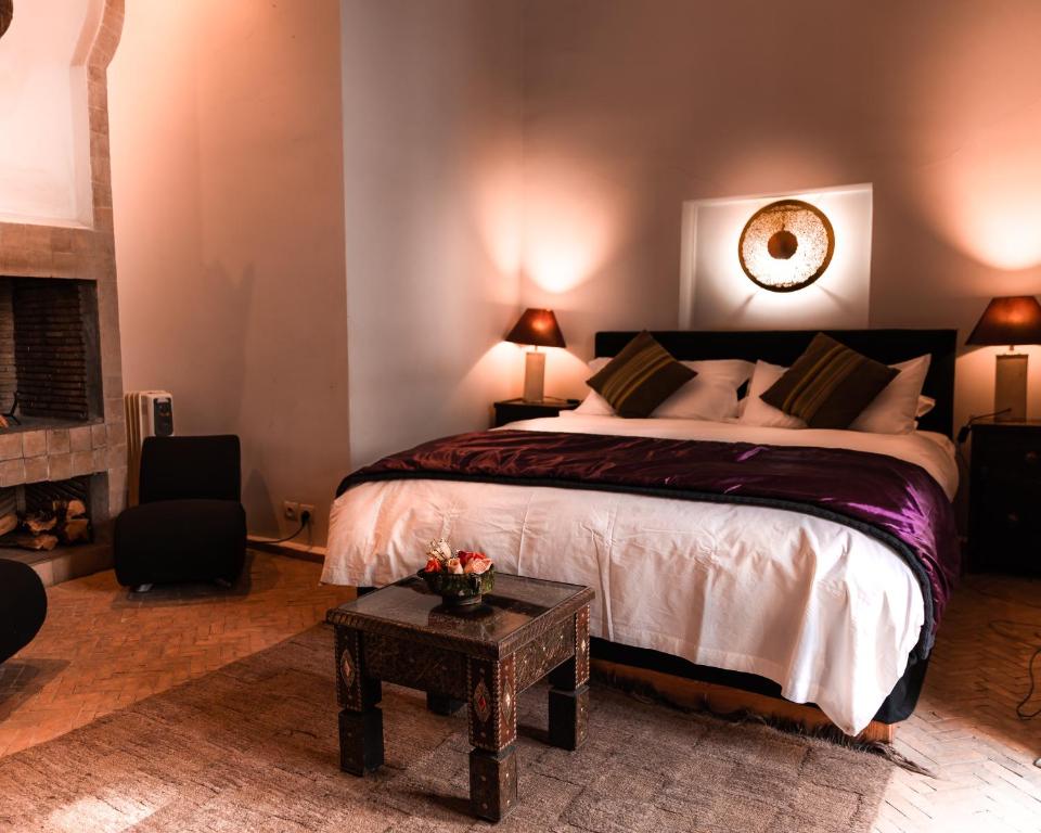 Postel nebo postele na pokoji v ubytování Riad Capaldi