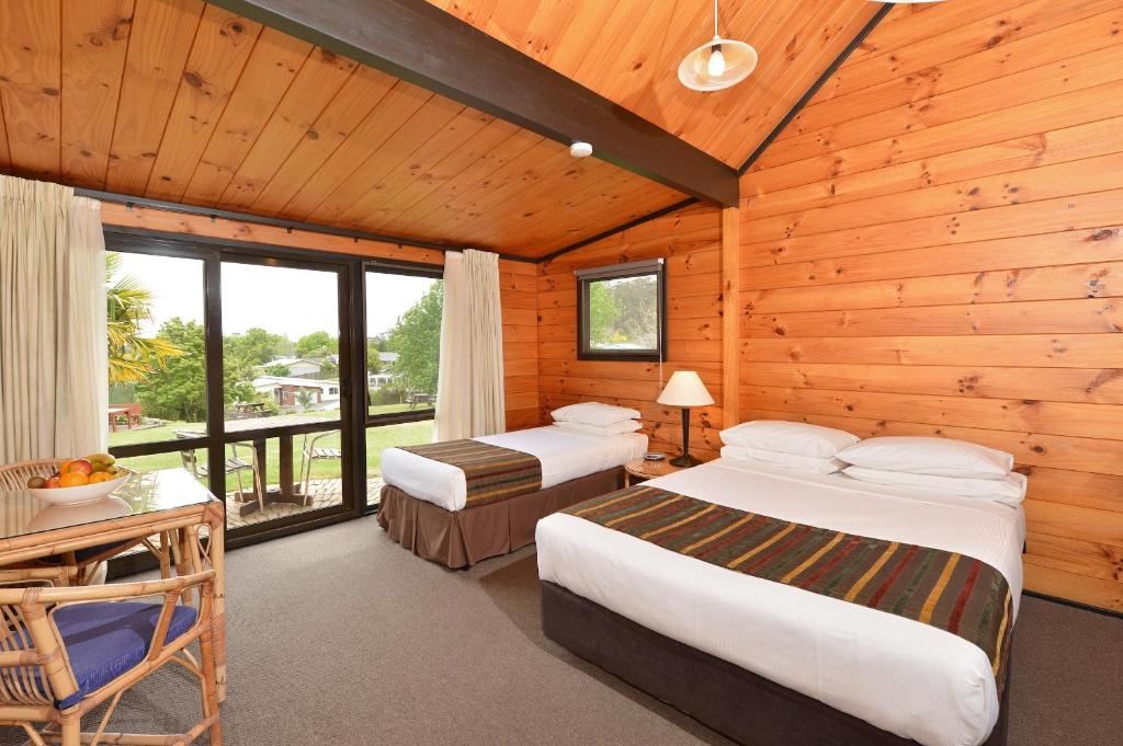 Postel nebo postele na pokoji v ubytování Kerikeri Homestead Motel & Apartments