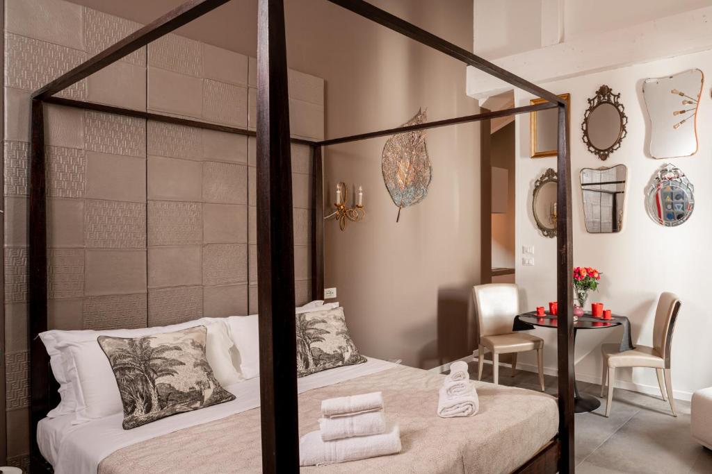 Łóżko lub łóżka w pokoju w obiekcie L'8 Boutique Design Apartments