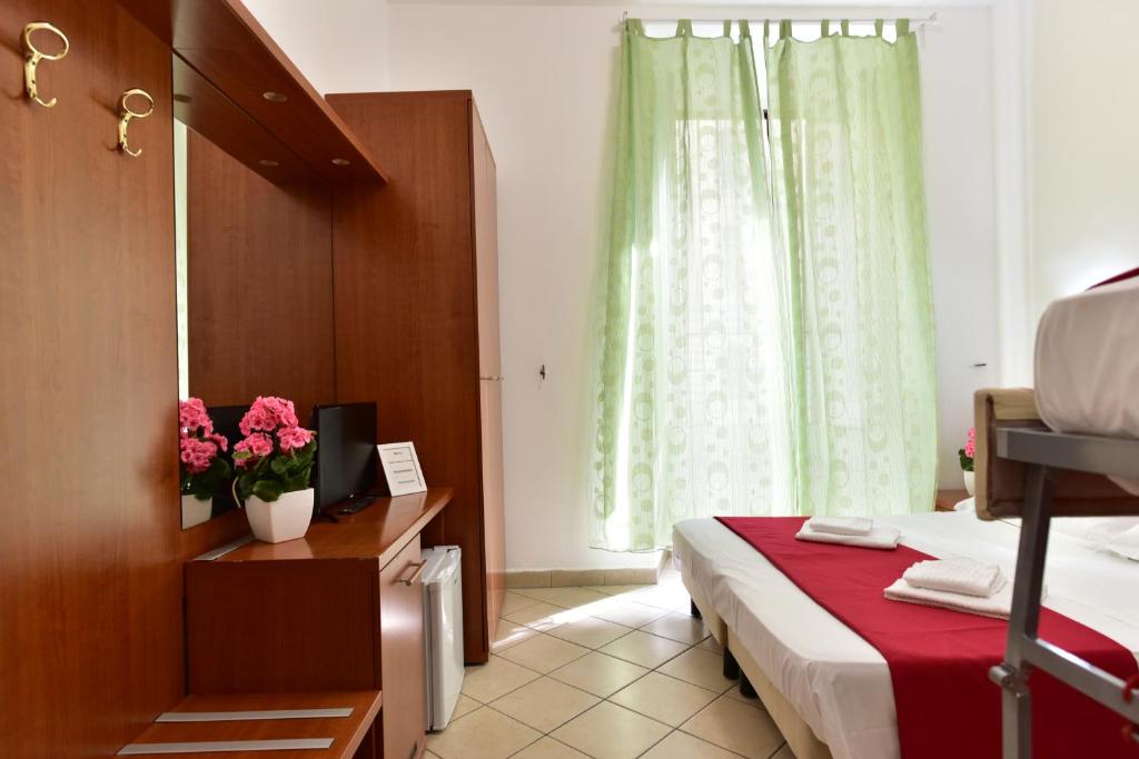 Posteľ alebo postele v izbe v ubytovaní B&B Termini