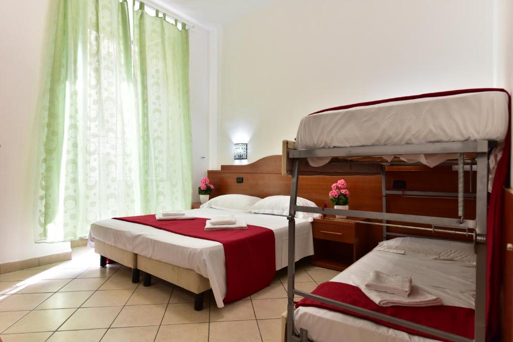 Posteľ alebo postele v izbe v ubytovaní B&B Termini