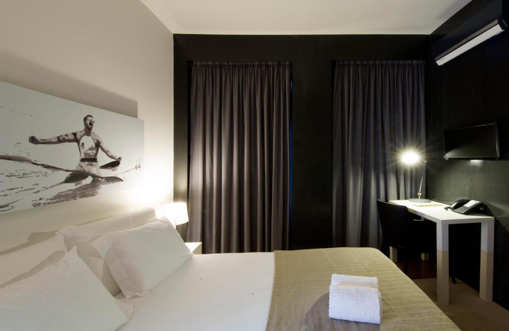 Postel nebo postele na pokoji v ubytování Arc My Otel