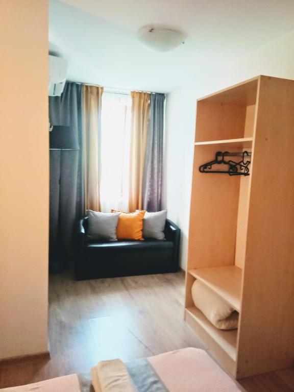 Postel nebo postele na pokoji v ubytování Central Guesthouse