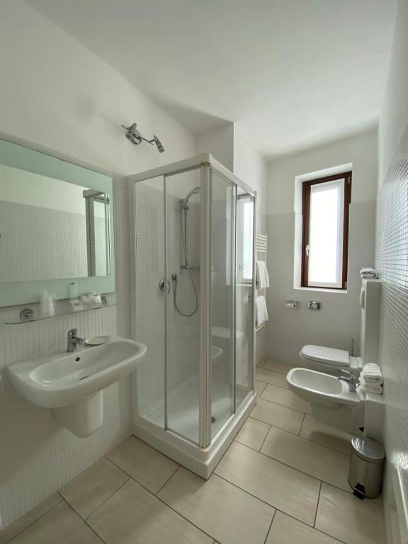 Koupelna v ubytování Hotel La Locanda