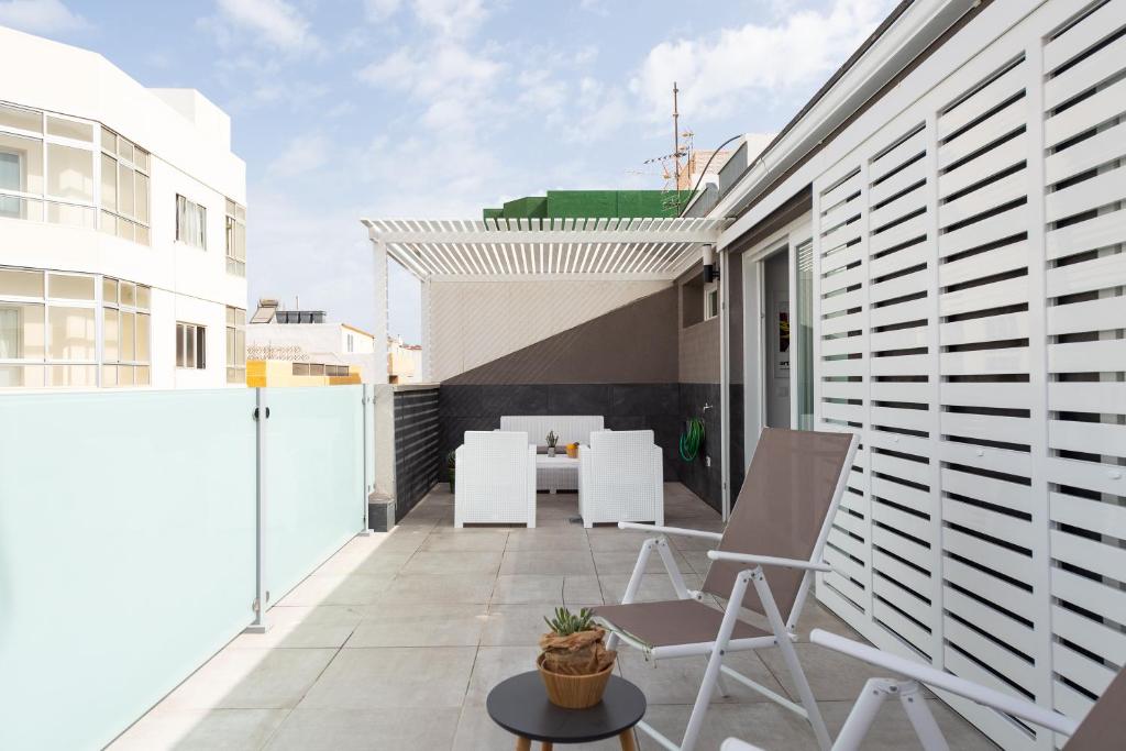 Balkón alebo terasa v ubytovaní Durmiendo sobre el mar, Vivienda Los Riscos