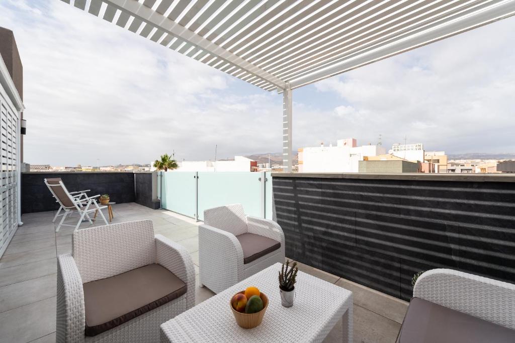 Balkón alebo terasa v ubytovaní Durmiendo sobre el mar, Vivienda Los Riscos