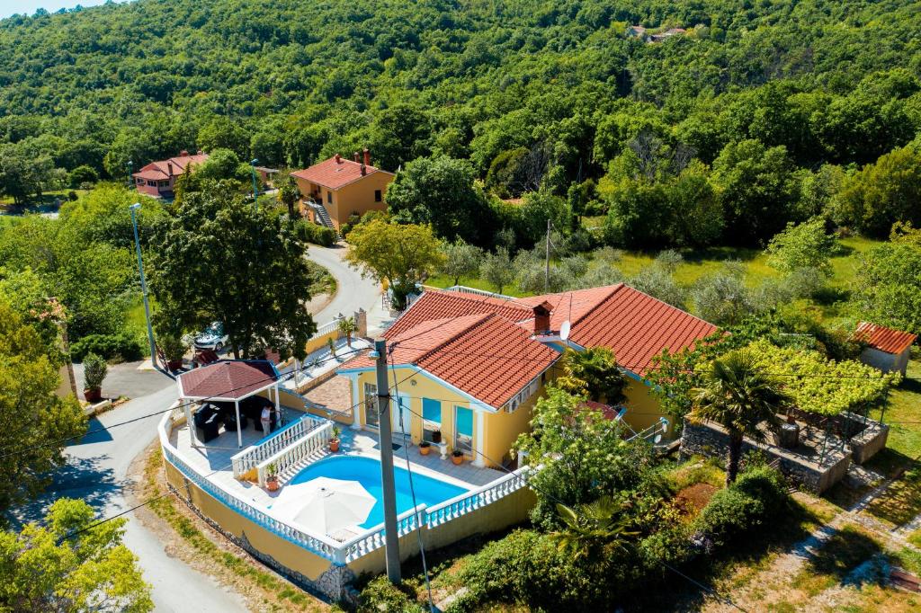 an aerial view of a house with a swimming pool at Villa Katarina in Labin