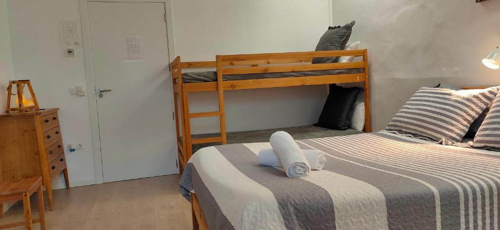Postel nebo postele na pokoji v ubytování Albergue Valderrobres Auto check-in