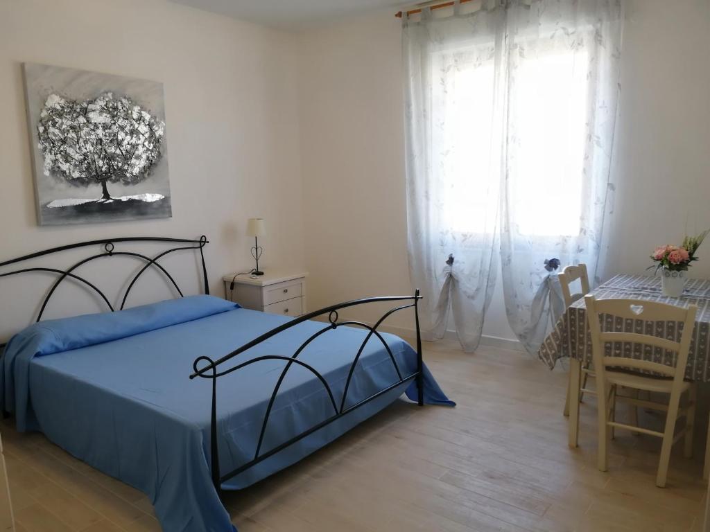 Postel nebo postele na pokoji v ubytování Alghero Mare Chiaro-Guest House