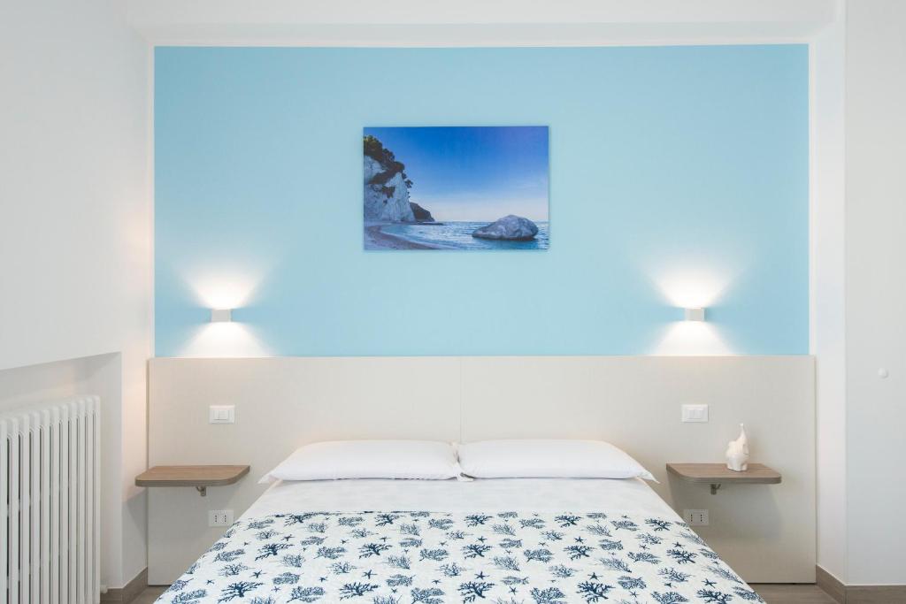 Postel nebo postele na pokoji v ubytování Nel Conero Affittacamere