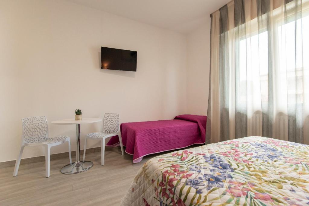 Postel nebo postele na pokoji v ubytování Nel Conero Affittacamere