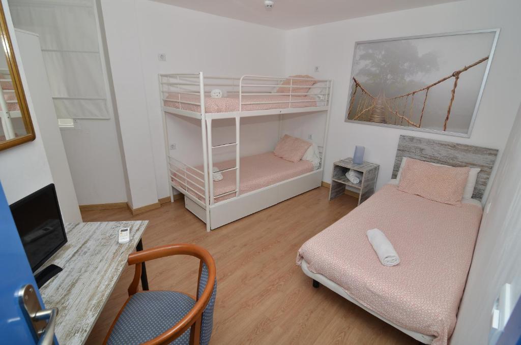 Posteľ alebo postele v izbe v ubytovaní Hotel Boutique Nomadas