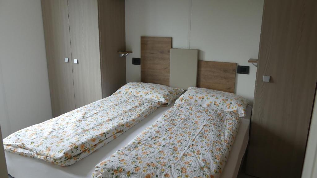 Postel nebo postele na pokoji v ubytování Agricampeggio Relax Maxicaravan