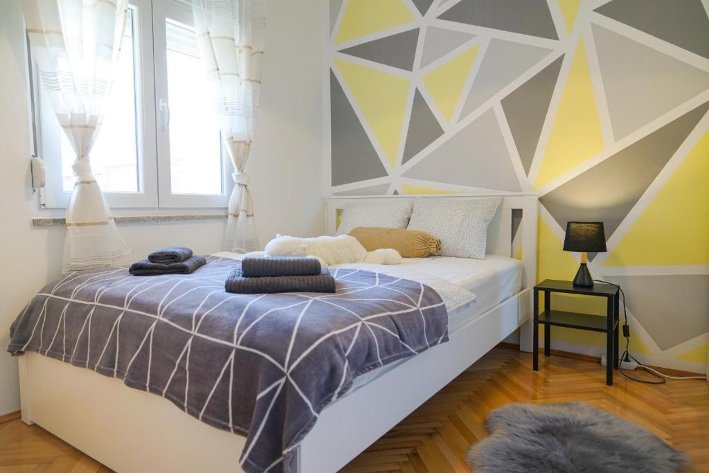 Posteľ alebo postele v izbe v ubytovaní Apartment Jardin with free cowered parking