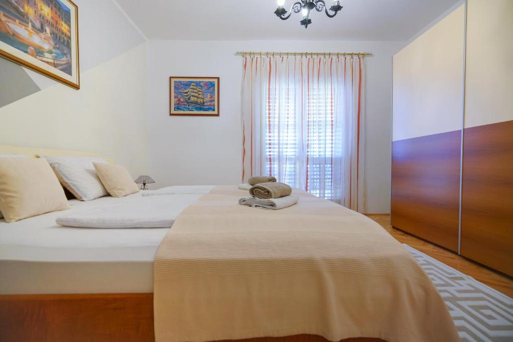 Posteľ alebo postele v izbe v ubytovaní Apartment Jardin with free cowered parking