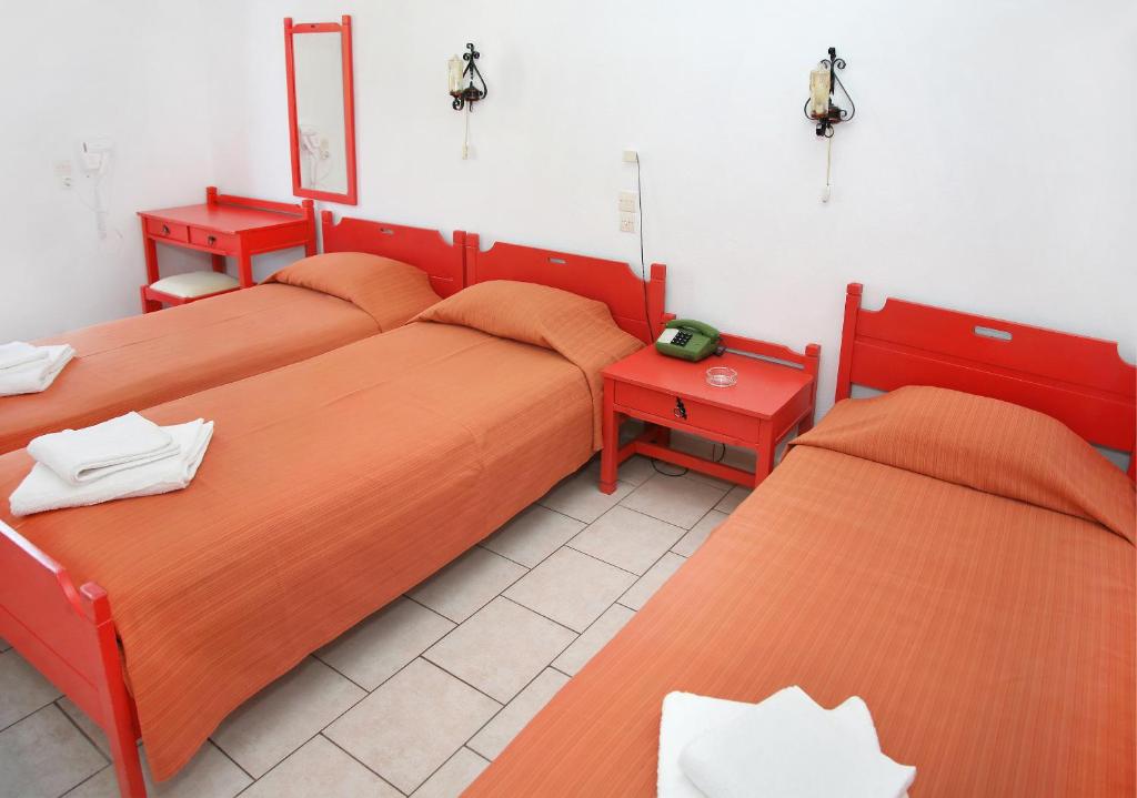Postel nebo postele na pokoji v ubytování Asterias Hotel - Seafront