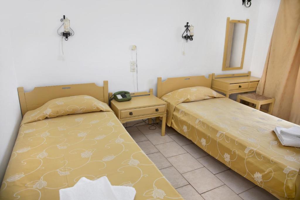 Postel nebo postele na pokoji v ubytování Asterias Hotel - Seafront
